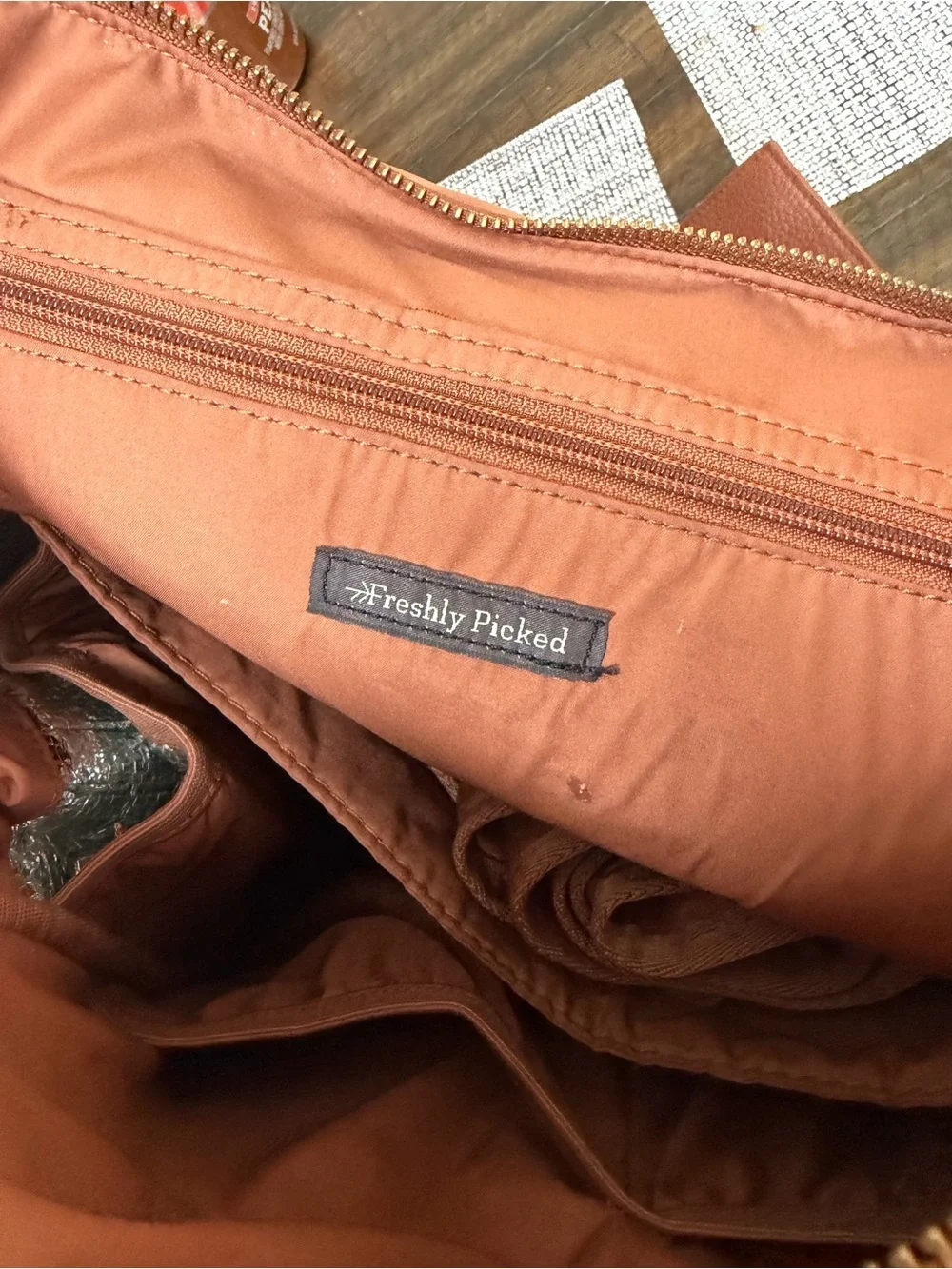 Freshly Picked Brown Leather-Textured Backpack with Gold Logo